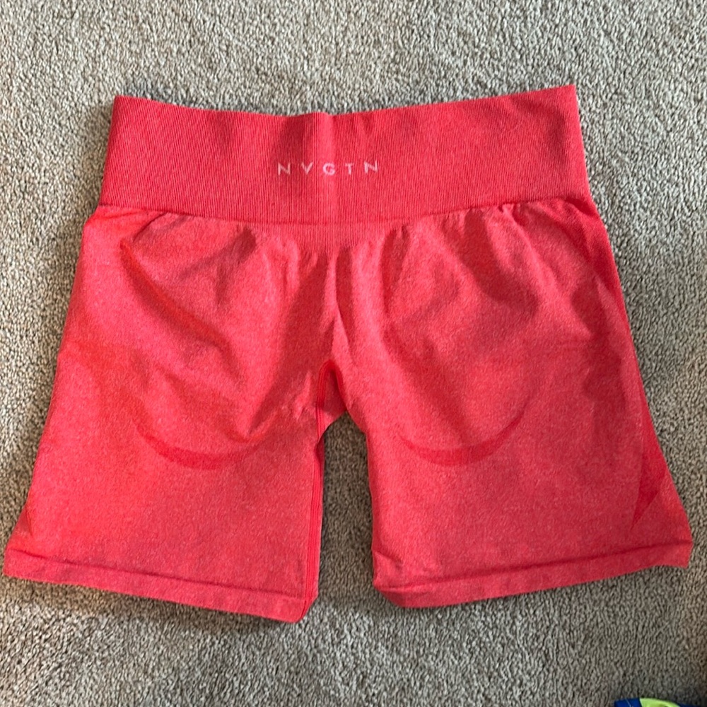 NVGTN Women's Athletic Shorts in Coral Red